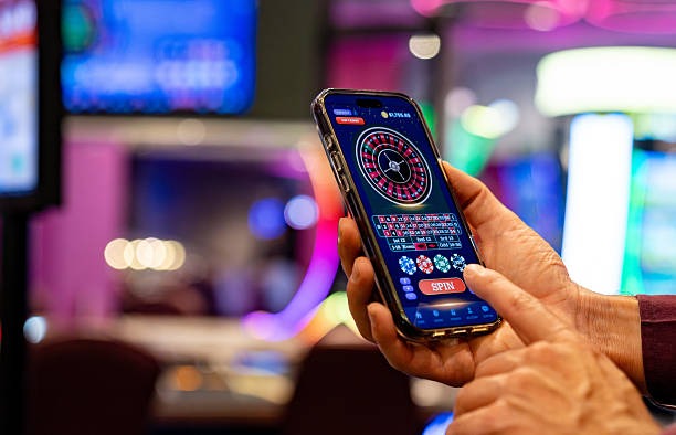 Three live dealer tables displayed side-by-side on tablet showing roulette, baccarat, and dragon tiger